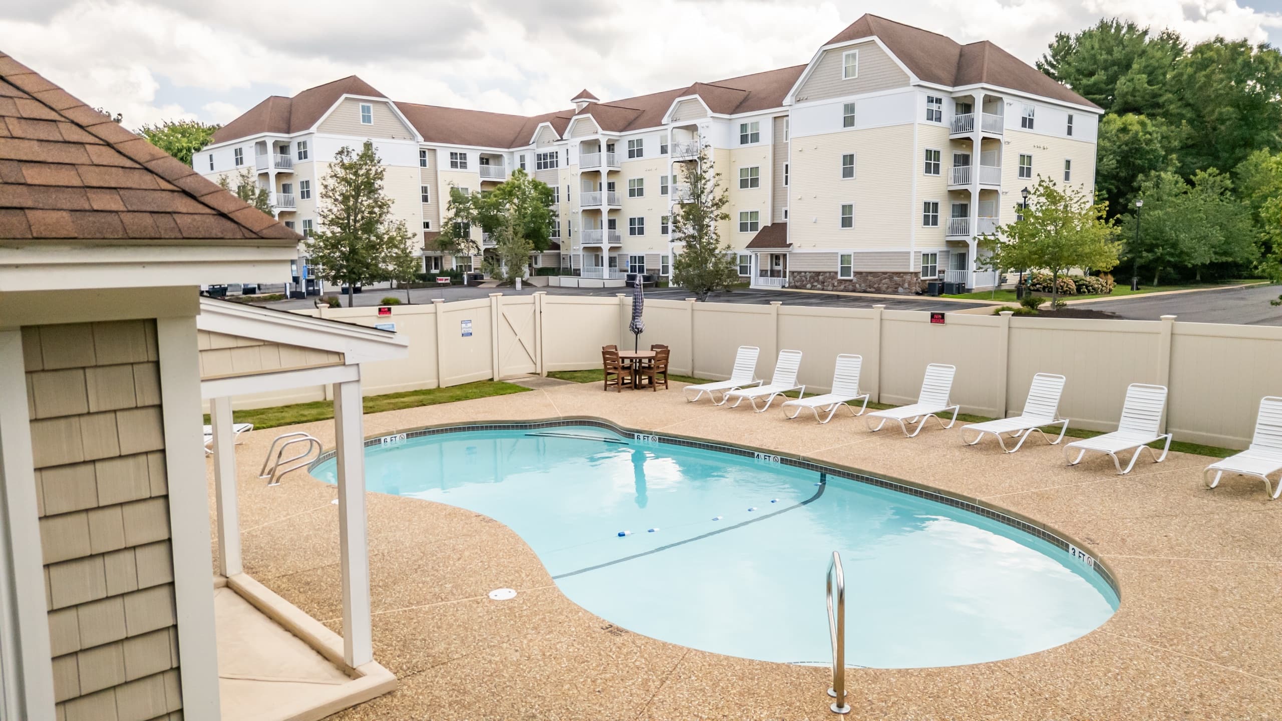 The outdoor pool and sun deck at Edgewood Apartments in Plainville, Massachusetts.